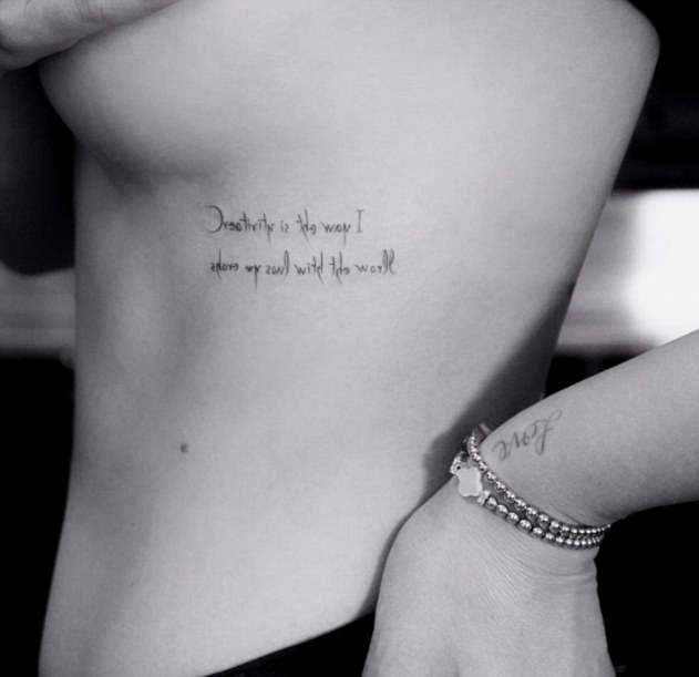 Тату Эшли Грин