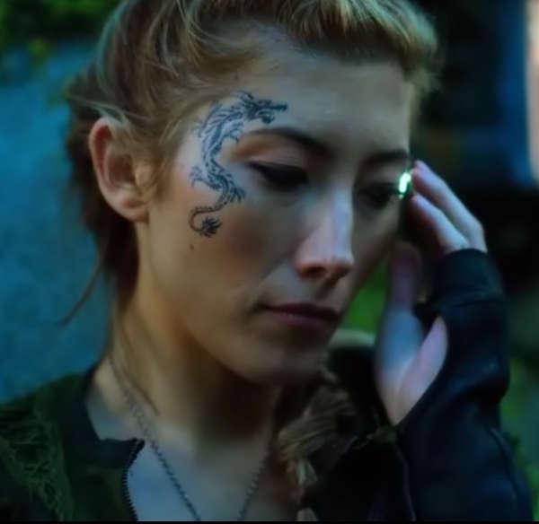 Тату дракон на лице 