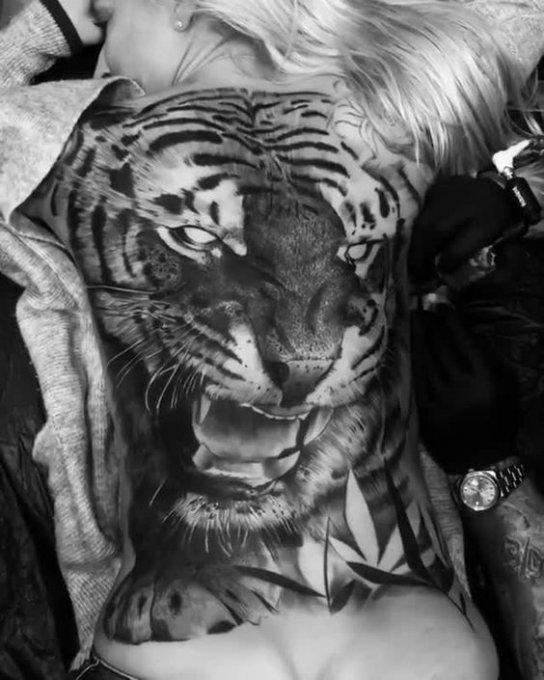 татуировка тигр у женщины значение