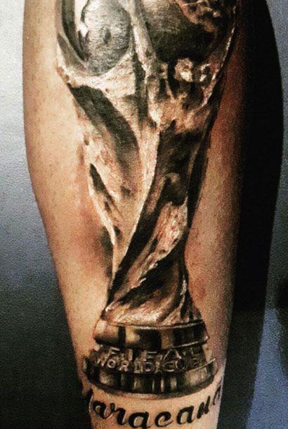 тату в честь трофея победы на чемпионате мира