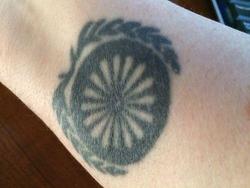 Тату цыганское колесо