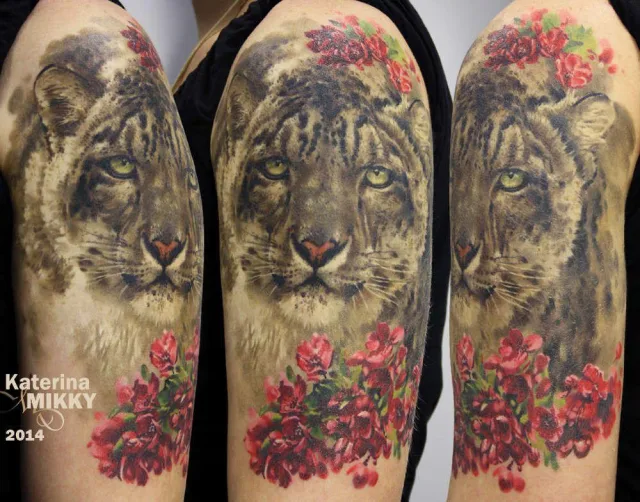 Тату снежный барс